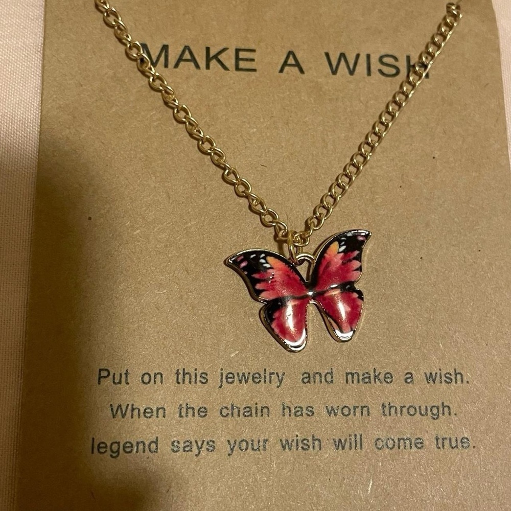 Gold tone orange and hot pink butterfly necklace gift with card.